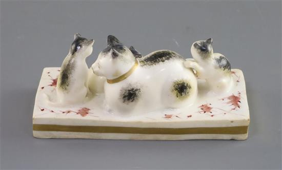 A Rockingham porcelain group of a cat and three kittens, c.1826-30, L. 10.8cm
